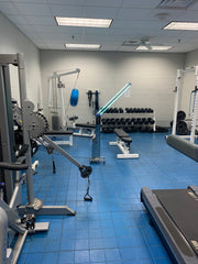 UV Rolling Cart sanitizer being used in a gym.
